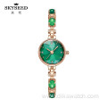 SKYSEED emerald type mother-of-pearl watch